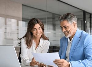 Business man getting help with office insurance uk